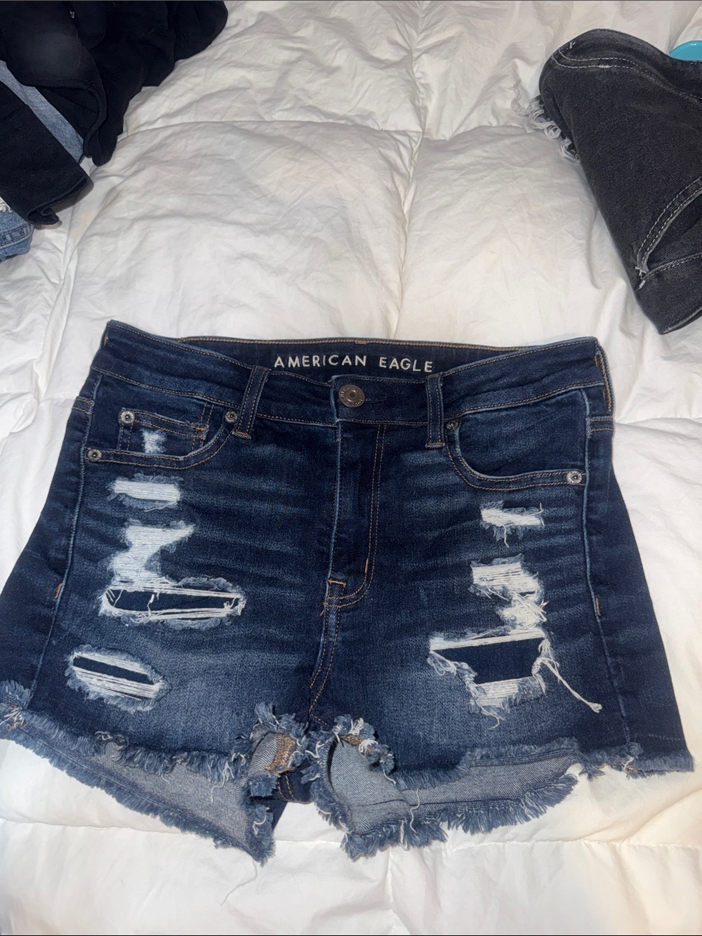 AMERICAN EAGLE NEXT LEVEL STRETCH DENIUM SHORTS